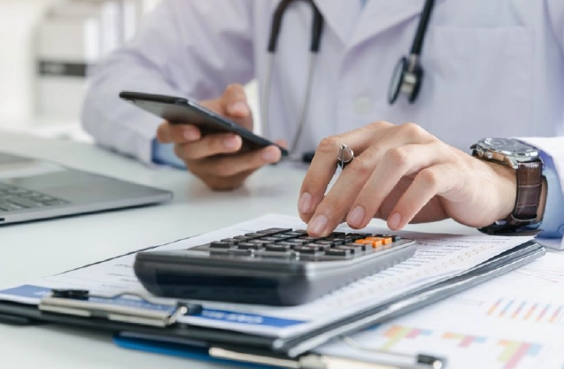 Business professional analyzing healthcare revenue cycle