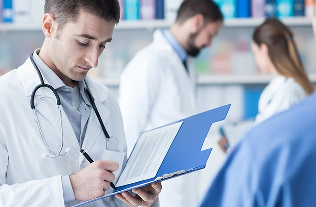 Healthcare professional verifying provider credentials