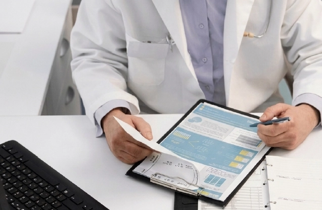 Specialist reviewing cardiology ICD coding