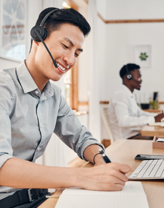 Customer support agent smiling