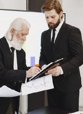 Professionals reviewing financial charts