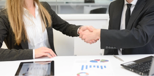 Professional business partnership handshake